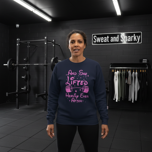Woman wearing a navy blue sweatshirt with pink text in a gym setting, featuring 'Sweat and Snarky' on the wall.